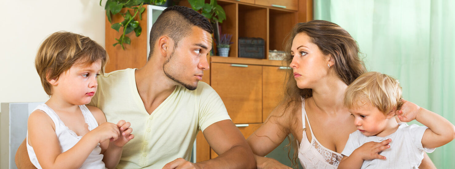Parents with children having quarrel